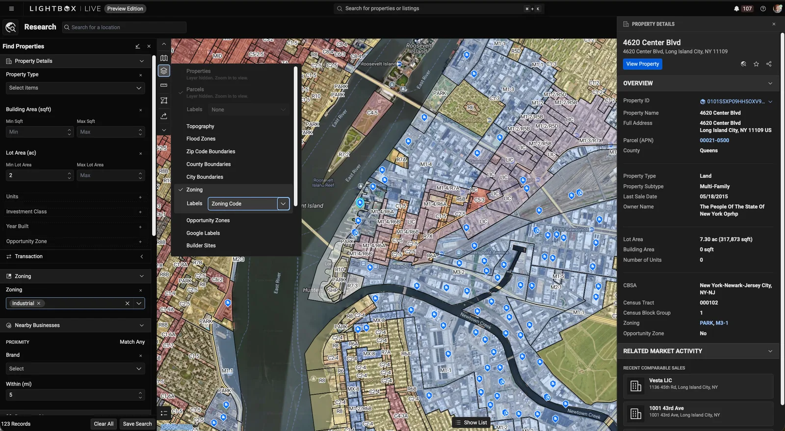 The LightBox Live Research map with the zoning layer on: color-coded zoning districts labelled with their codes over Long Island City, a layer menu and property filters on the left, and a property details panel for 4620 Center Blvd on the right.
