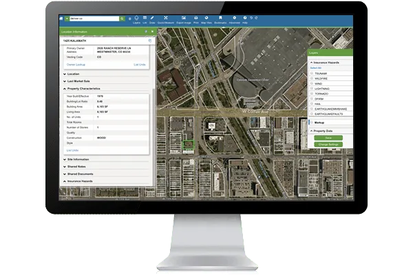 CanMap Content Suite mapping layers shown on a desktop monitor.
