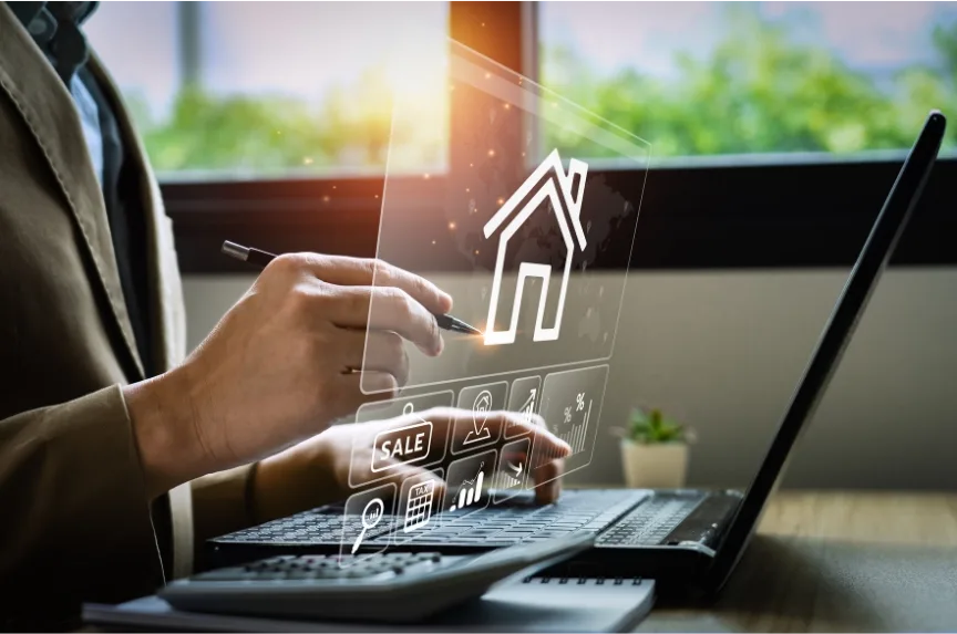 Lenders reviewing property due diligence on a laptop.