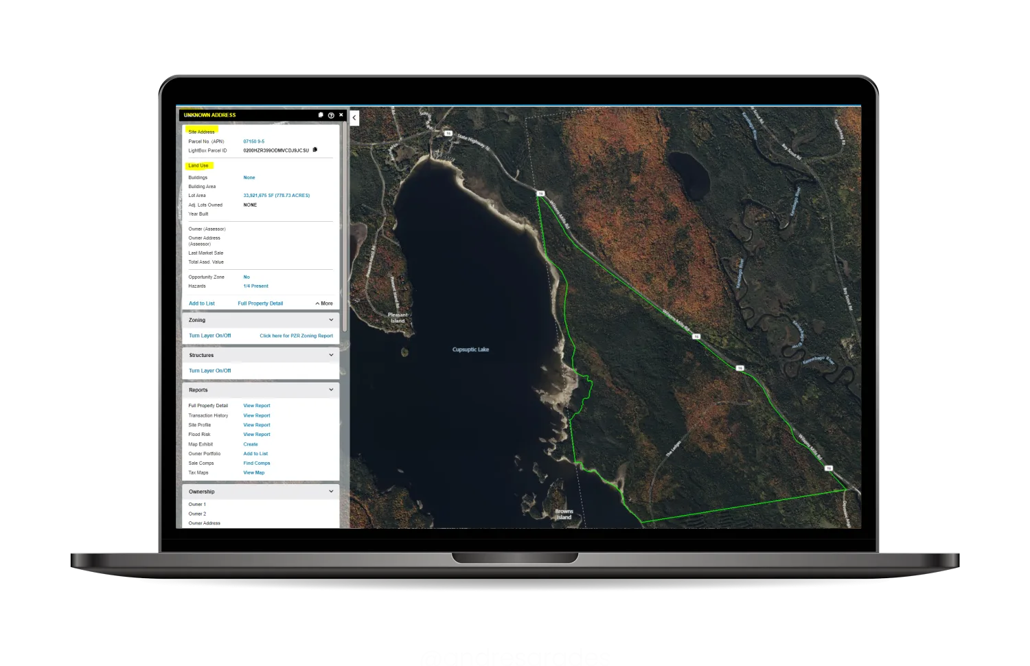 A large undeveloped parcel outlined on a LightBox map, with its property detail and report list alongside.