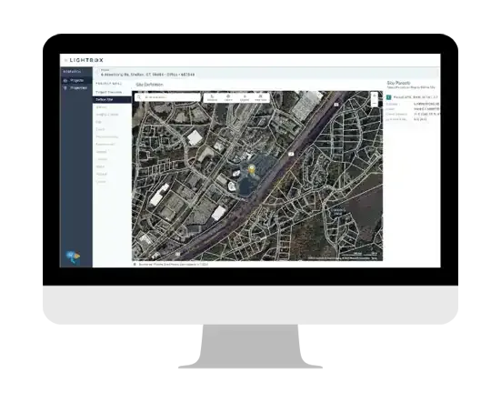 An appraiser working through property records and comparable sales on screen.