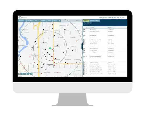 An EDR environmental records report open beside a site map.